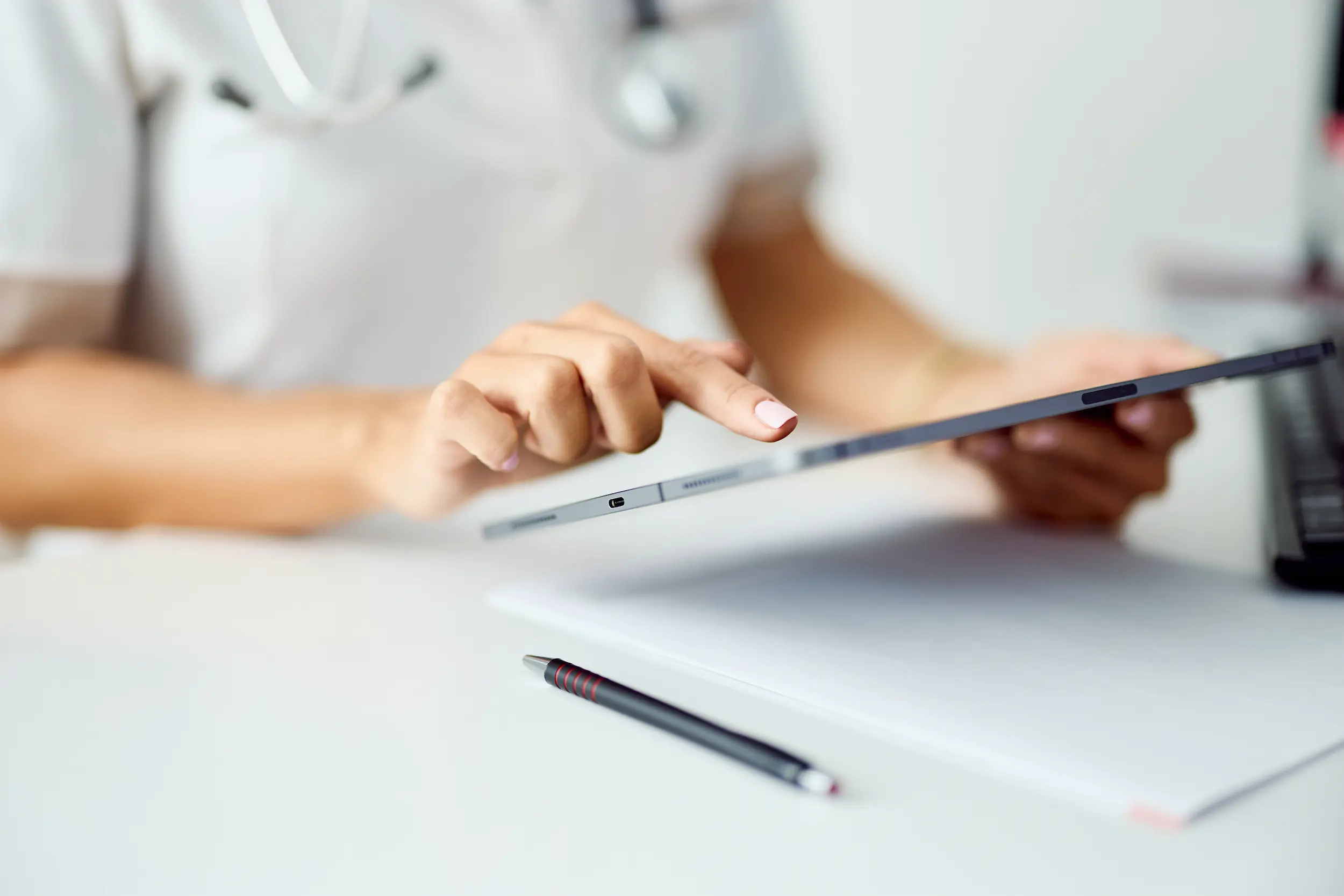 adult working with a tablet at work 2026