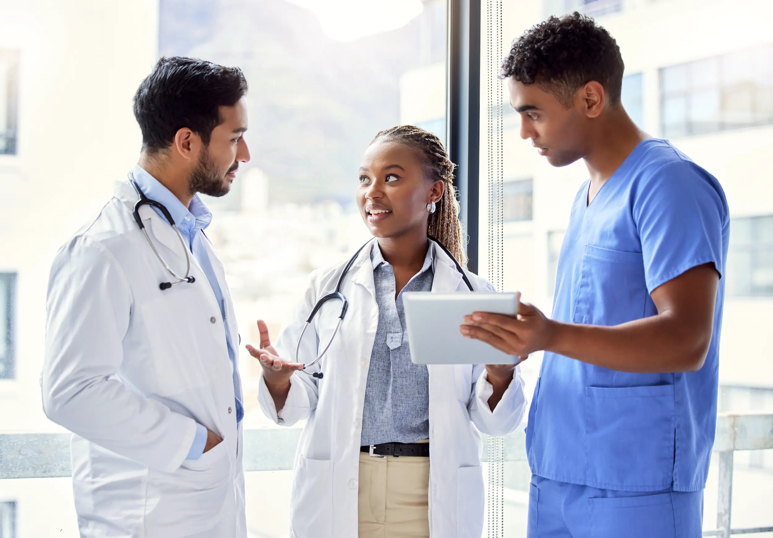 medical professionals collaborate during a meeting